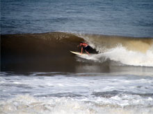 Surfers often get barreled at Hermosa Beach.