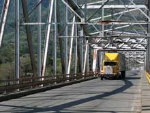 The bridge over the Rio Grande de Terraba connects Palmar Norte with Palmar Sur.